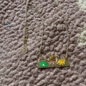 Adorable Land Before Time pendant necklace from hot topic